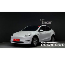 Tesla Model Y 2024 г.